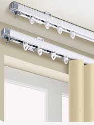 Wall mounted curtain tracks