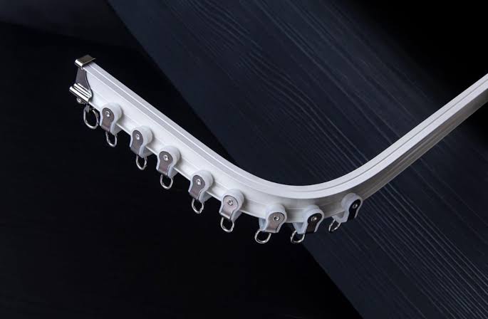 Wall mounted curtain rails